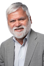 Headshot of Dr Pradeep Taneja