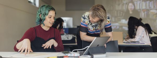 Academic and student in design studio, Southbank