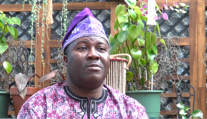 Mr. Kunle Kolapo explains that Yoruba tribal face markings are a matter of cultural identity and pride Photo by Adrian Hearn. Mr. Kunle Kolapo explains that Yoruba tribal face markings are a matter of cultural identity and pride Photo by Adrian Hearn.