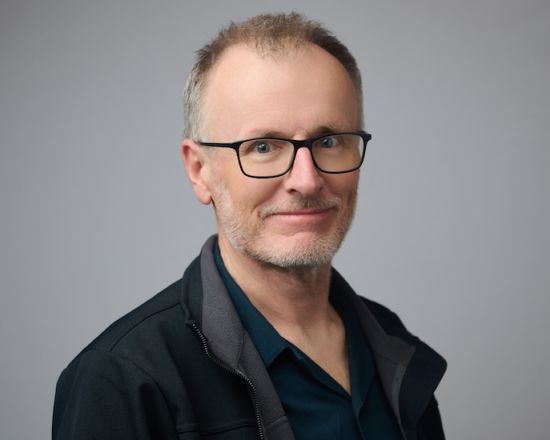 Image for Man wearing glasses in-front of white background