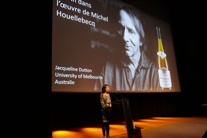 female speaking on stage