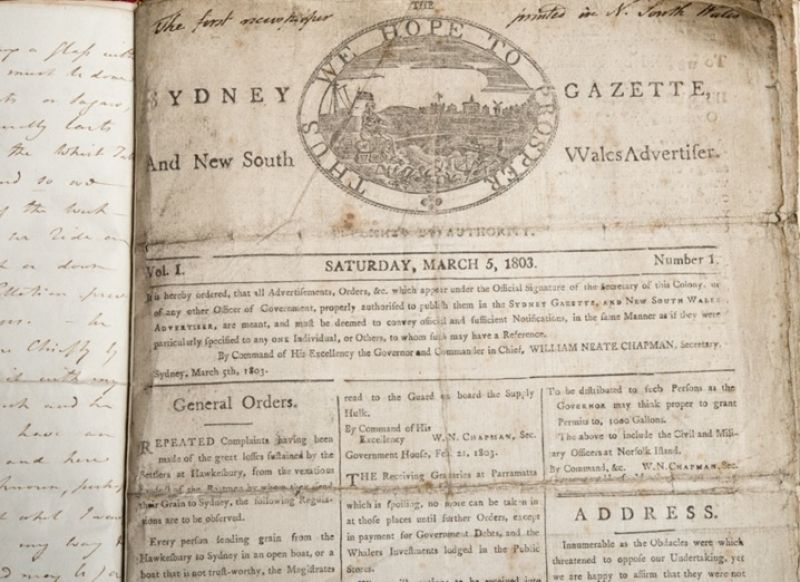 Image shows an old copy of the Sydney Gazette newspaper dated Saturday, March 5, 1803. The contents of the newspaper is indistinct.