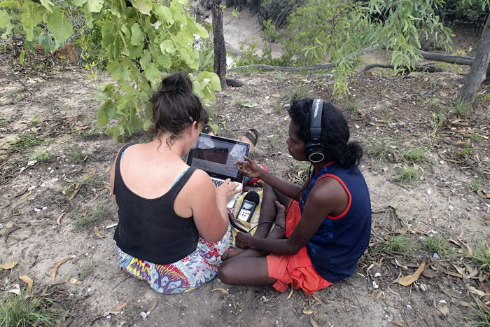 University of Melbourne researcher Lucy Davidson and Murrinhpatha language consultant Joseline Perdjert transcribing children's speech, near Wadeye, Northern Territory
