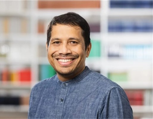 A person smiling at the camera