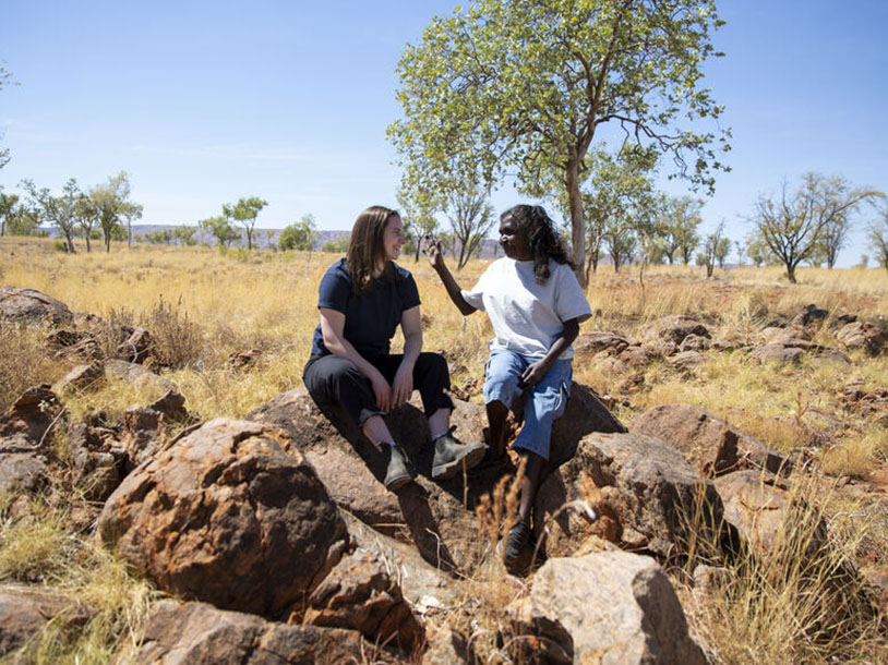 Grimwade Centre Research Assistant Hannah Stewart with Warmun Art Centre worker Dolorosa Carrington