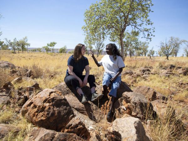 Grimwade Centre Research Assistant Hannah Stewart with Warmun Art Centre worker Dolorosa Carrington