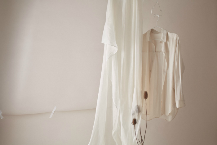 shirt and material hanging with cotton plant