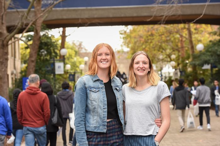 two female students at entrance of university of melbourne