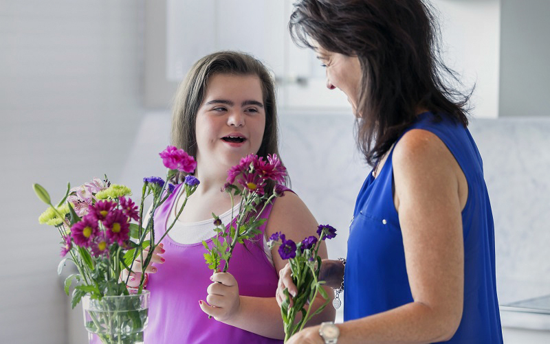 Disabled women with flowers