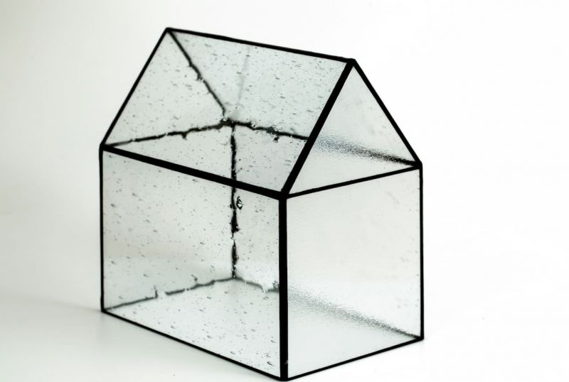 A glass house with a black border