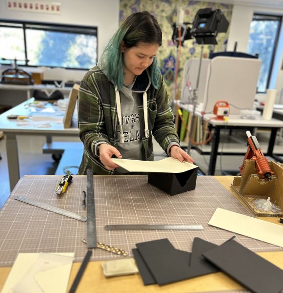 Fei Stokes building book cradles